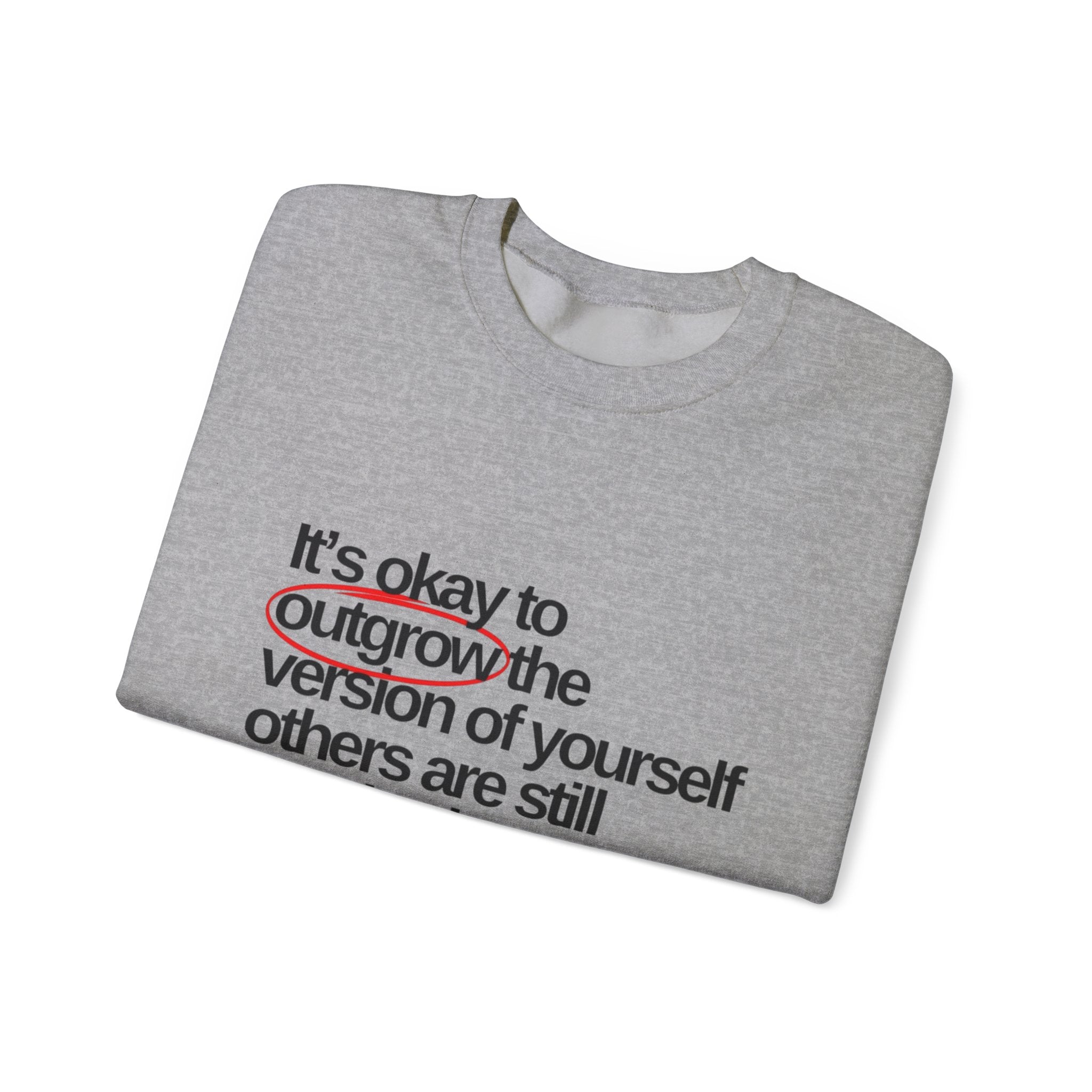 Inspirational Crewneck Sweatshirt — "It's okay to outgrow the version of yourself others are still attached to"